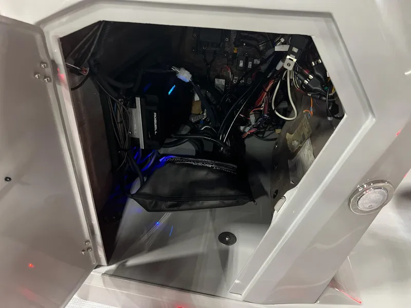 Slide: The Image of Interior view of 2025 Berkshire 25RFX Roswell Arch STS Tritoon, showcasing wiring and components. - 44