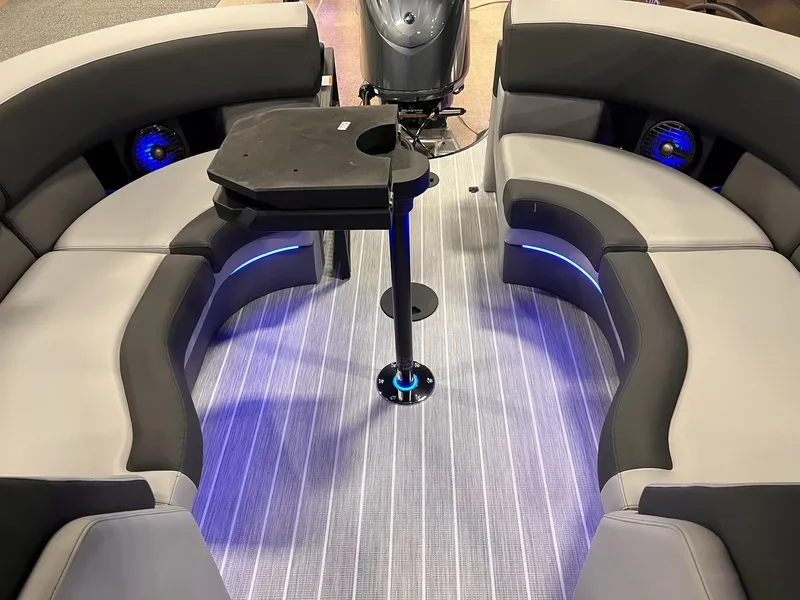 Slide: The Image of 2025 Berkshire 25RFX Roswell Arch STS Tritoon interior with modern seating and ambient lighting. - 47