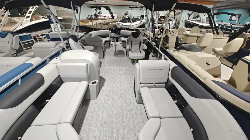 Slide: The Image of 2024 South Bay 224RS LE 2.75 pontoon boat interior with luxurious seating. - 6