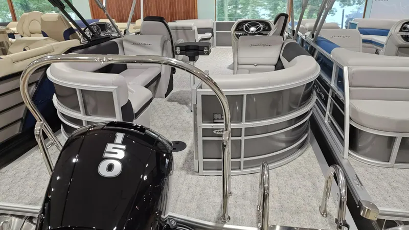 Slide: The Image of 2024 South Bay 224RS LE 2.75 pontoon boat interior with 150 horsepower engine. - 7