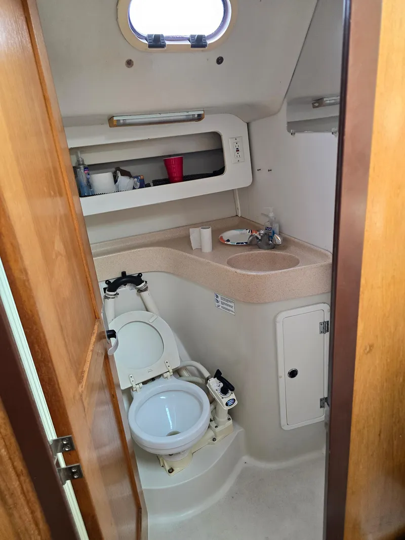 Slide: The Image of Bathroom of a 2000 Catalina 380 yacht. - 12