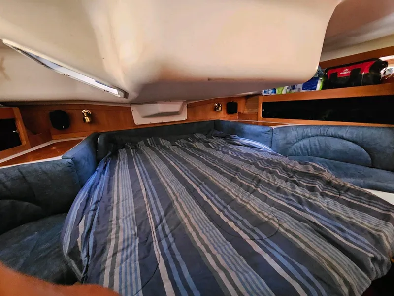 Slide: The Image of Interior of a 2000 Catalina 380 yacht with cozy bed. - 14