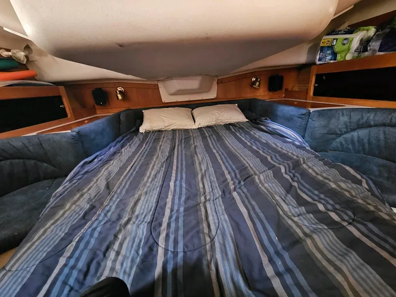 Slide: The Image of Interior of a 2000 Catalina 380 yacht with cozy bed. - 15