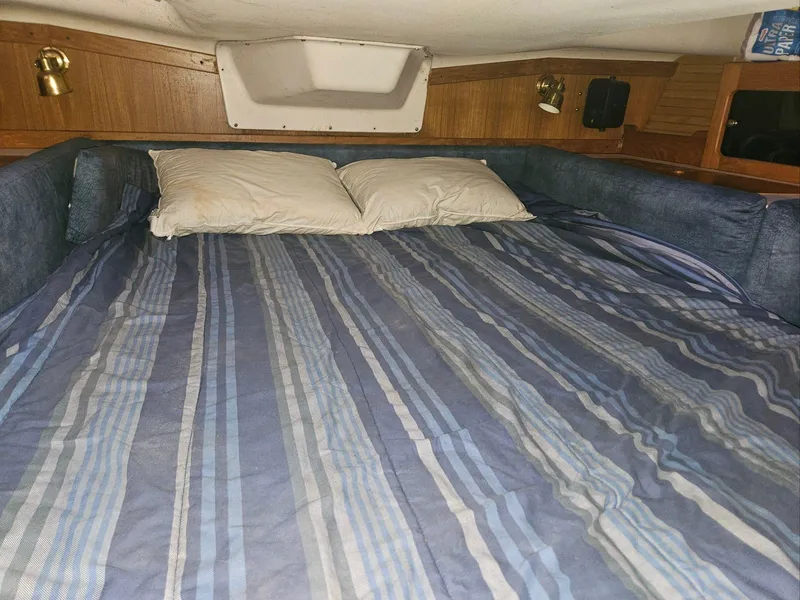 Slide: The Image of Cabin bed in a 2000 Catalina 380 yacht. - 16