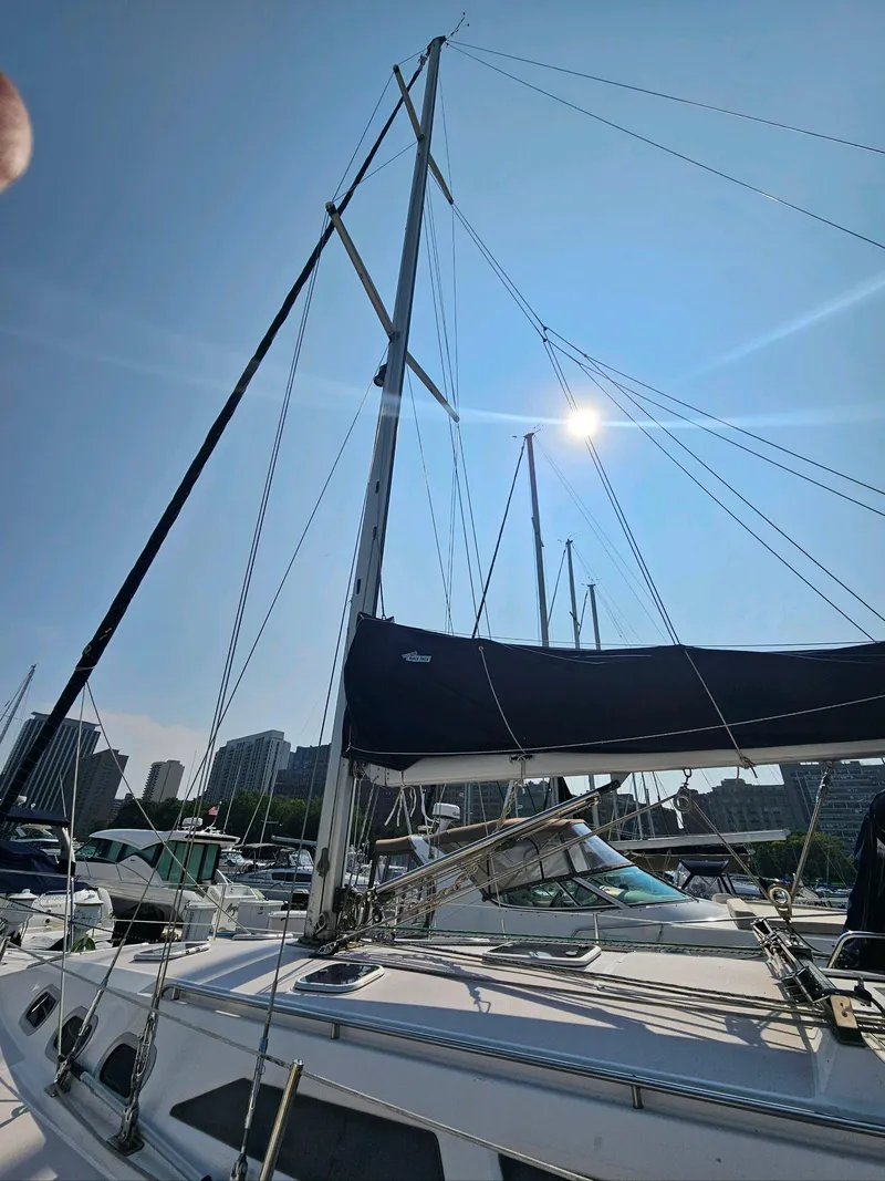Slide: The Image of Catalina 380 sailboat from 2000 docked under sunny sky. - 2