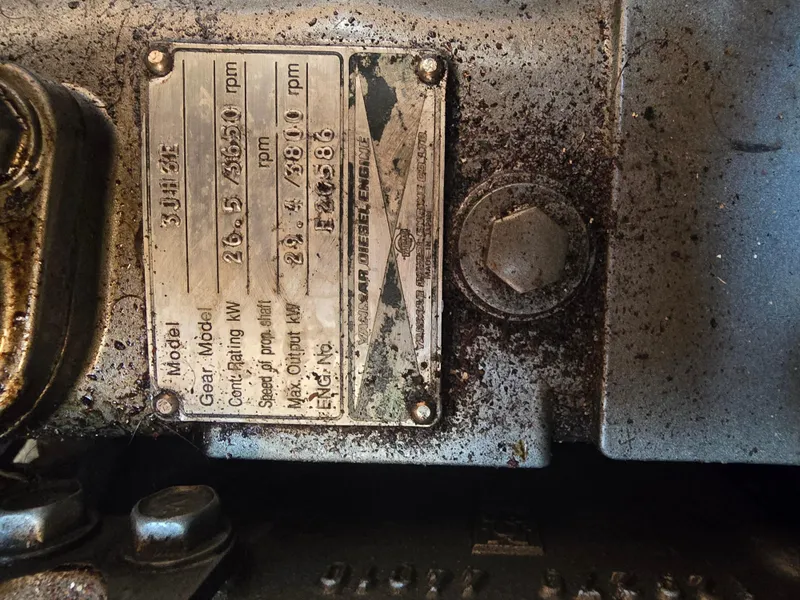 Slide: The Image of Close-up of Yanmar diesel engine plate on Catalina 380, year 2000. - 24