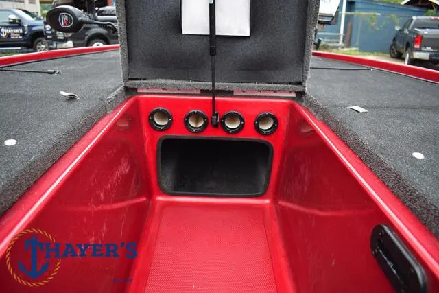 Slide: The Image of 2014 Nitro Z Series Z-6 boat interior with storage compartments and Thayer's logo. - 15