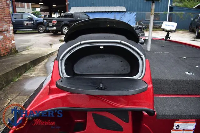 Slide: The Image of 2014 Nitro Z Series Z-6 boat storage compartment, red exterior, Thayer's Marine logo visible. - 20