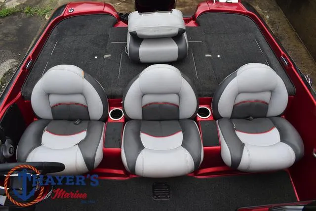 Slide: The Image of 2014 Nitro Z Series Z-6 boat interior with four gray and red seats. - 21