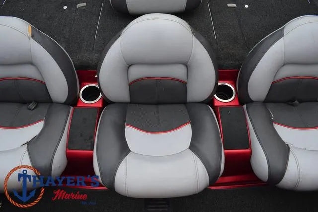 Slide: The Image of 2014 Nitro Z Series Z-6 boat seats with cup holders, gray and red design. - 22