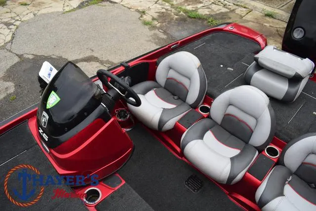 Slide: The Image of 2014 Nitro Z Series Z-6 boat interior with gray and red seating. - 23