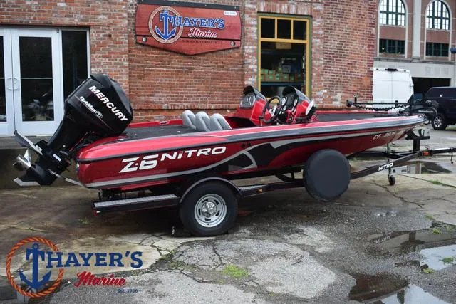 Slide: The Image of 2014 Nitro Z Series Z-6 boat, red, on trailer at Thayer's Marine. - 3