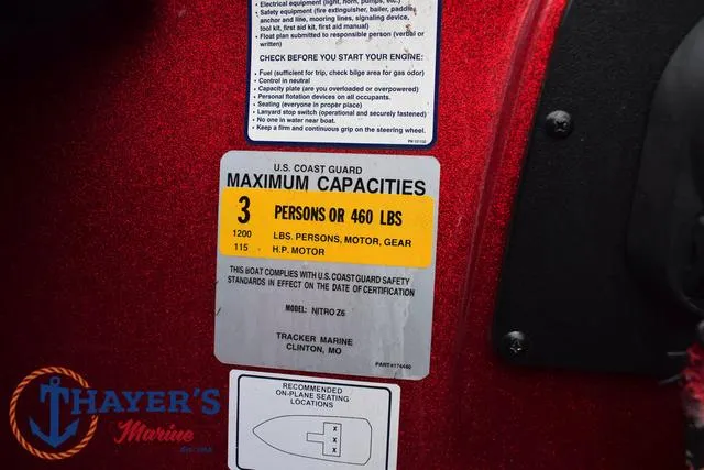 Slide: The Image of Capacity label on 2014 Nitro Z Series Z-6 boat, showing limits and safety compliance. - 30
