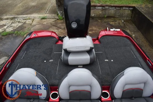 Slide: The Image of 2014 Nitro Z Series Z-6 boat interior with gray seats and carpeted deck. - 31