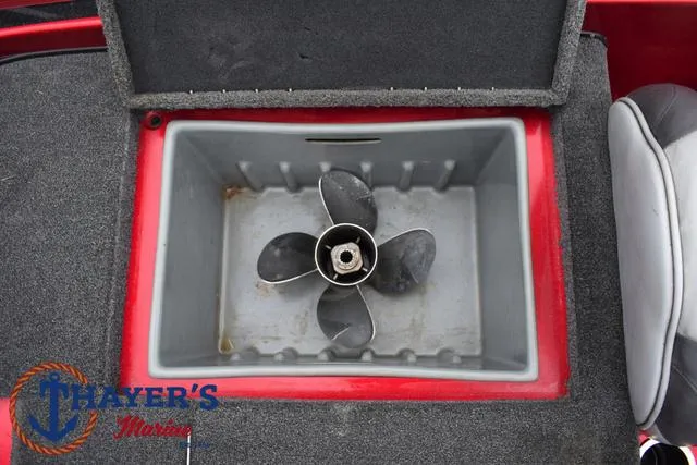 Slide: The Image of 2014 Nitro Z Series Z-6 boat storage compartment with propeller inside. - 33
