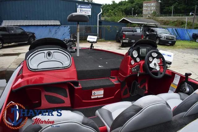 Slide: The Image of 2014 Nitro Z Series Z-6 boat interior with steering wheel and seating at Thayer's Marine. - 36