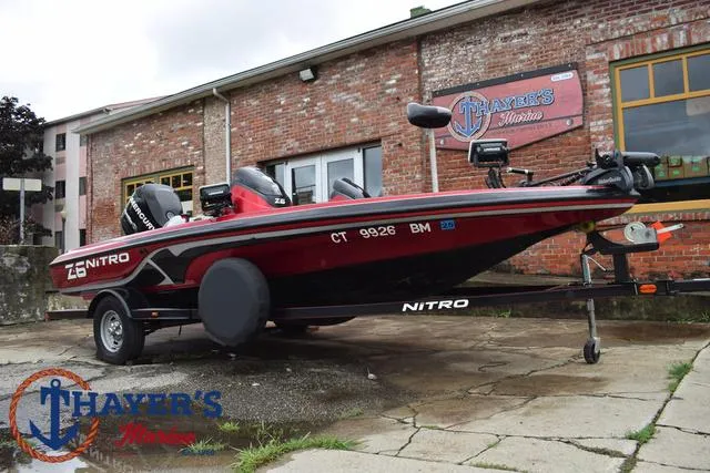 Slide: The Image of 2014 Nitro Z Series Z-6 boat parked outside Thayer's Marine. - 39