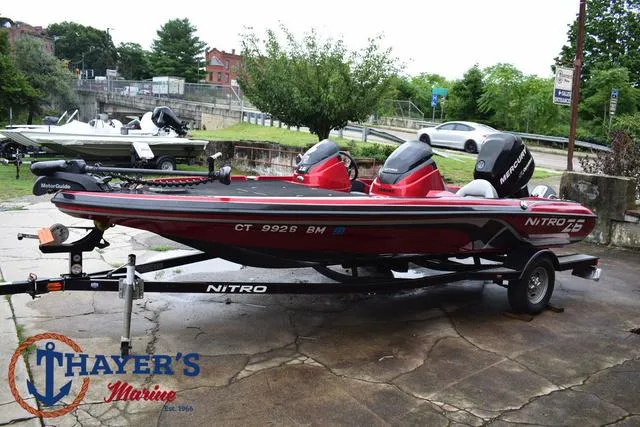 Slide: The Image of 2014 Nitro Z Series Z-6 boat on trailer at Thayer's Marine. - 7