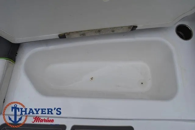 Slide: The Image of 2022 Tahoe T16 boat storage compartment at Thayer's Marine. - 14