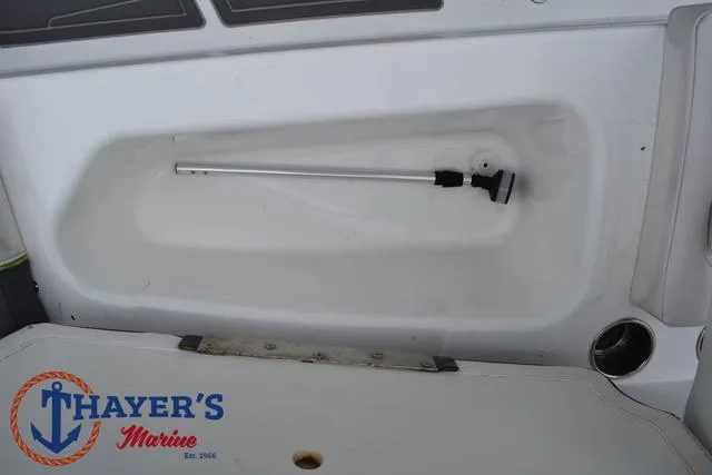 Slide: The Image of 2022 Tahoe T16 boat interior with storage compartment and Thayer's Marine logo. - 15