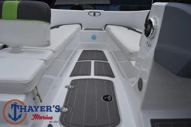 Slide: The Image of 2022 Tahoe T16 boat interior with seating and Thayer's Marine logo. - 17