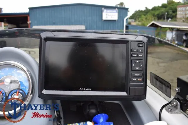 Slide: The Image of Garmin display on 2022 Tahoe T16 boat dashboard at Thayer's Marine. - 23