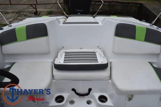 Slide: The Image of 2022 Tahoe T16 boat interior with gray and green seating, Thayer's Marine logo visible. - 29