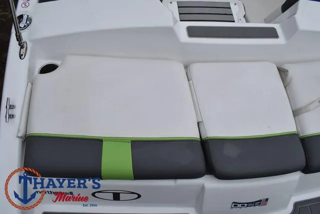 Slide: The Image of 2022 Tahoe T16 boat seating with green accents, Thayer's Marine logo visible. - 31