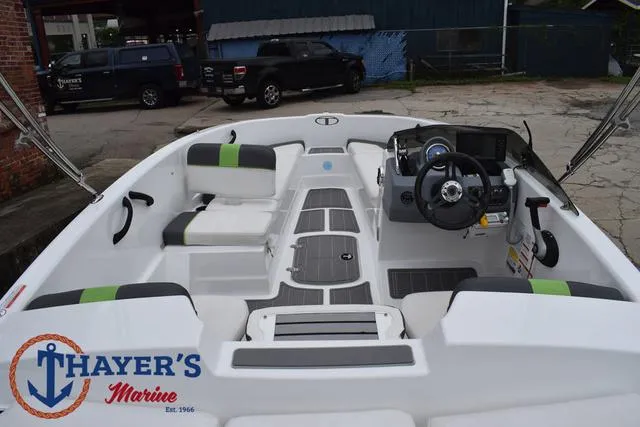 Slide: The Image of 2022 Tahoe T16 boat interior with seating and steering, displayed at Thayer's Marine. - 36