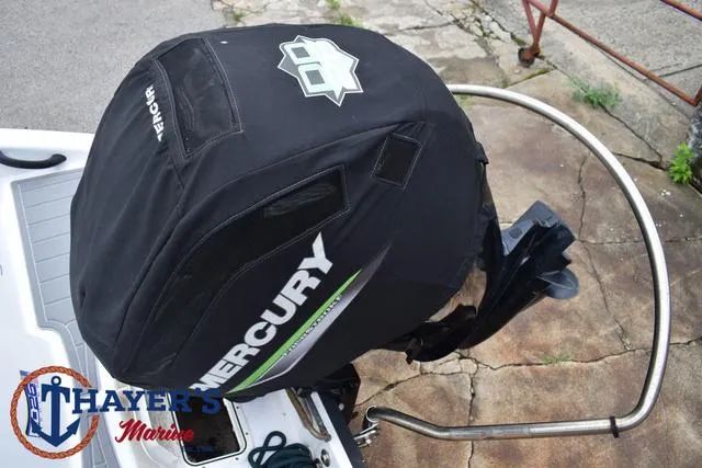 Slide: The Image of 2022 Tahoe T16 boat with Mercury engine cover at Thayer's Marine. - 38