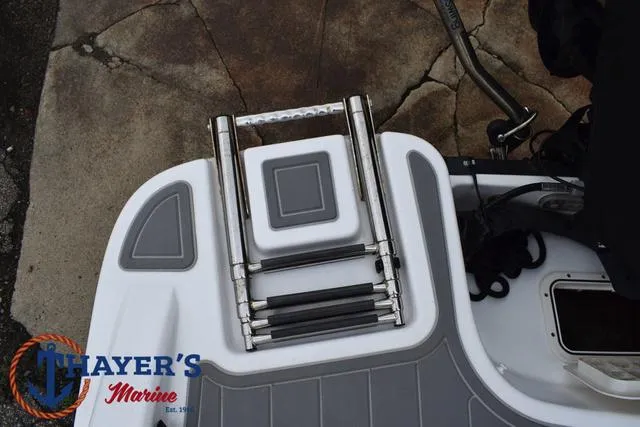 Slide: The Image of Tahoe T16 2022 boat with foldable ladder, Thayer's Marine logo visible. - 39