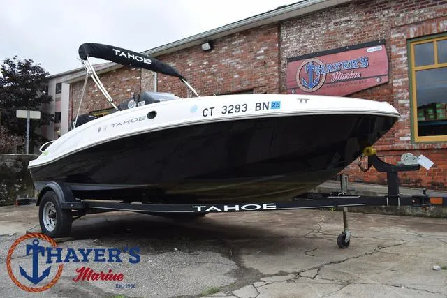 Slide: The Image of 2022 Tahoe T16 boat on trailer at Thayer's Marine dealership. - 42
