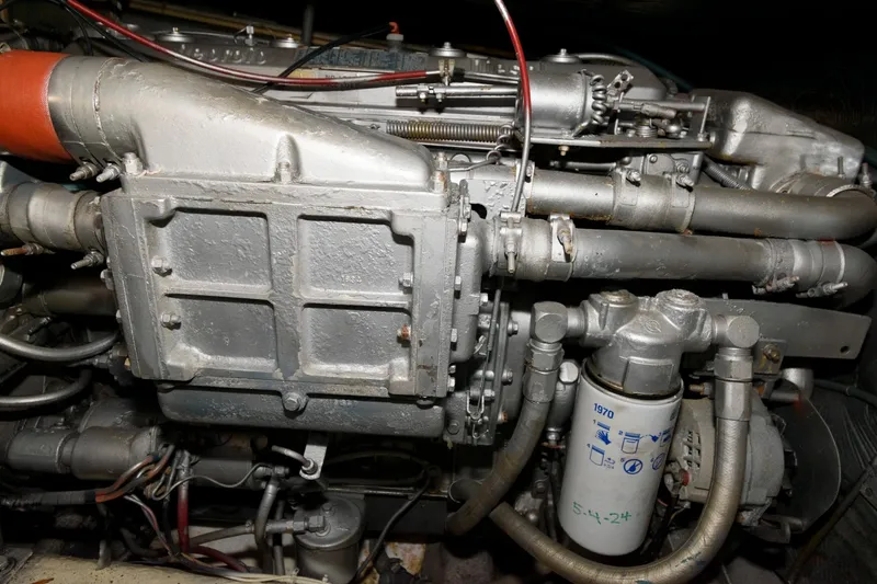 Slide: The Image of Engine of 1985 Ocean Yachts 46 Aft Cabin Motor Yacht, showcasing intricate mechanical components. - 27