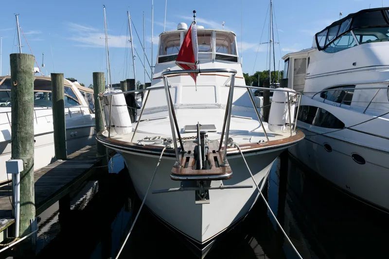 Slide: The Image of 1985 Ocean Yachts 46 Aft Cabin Motor Yacht docked at marina. - 4