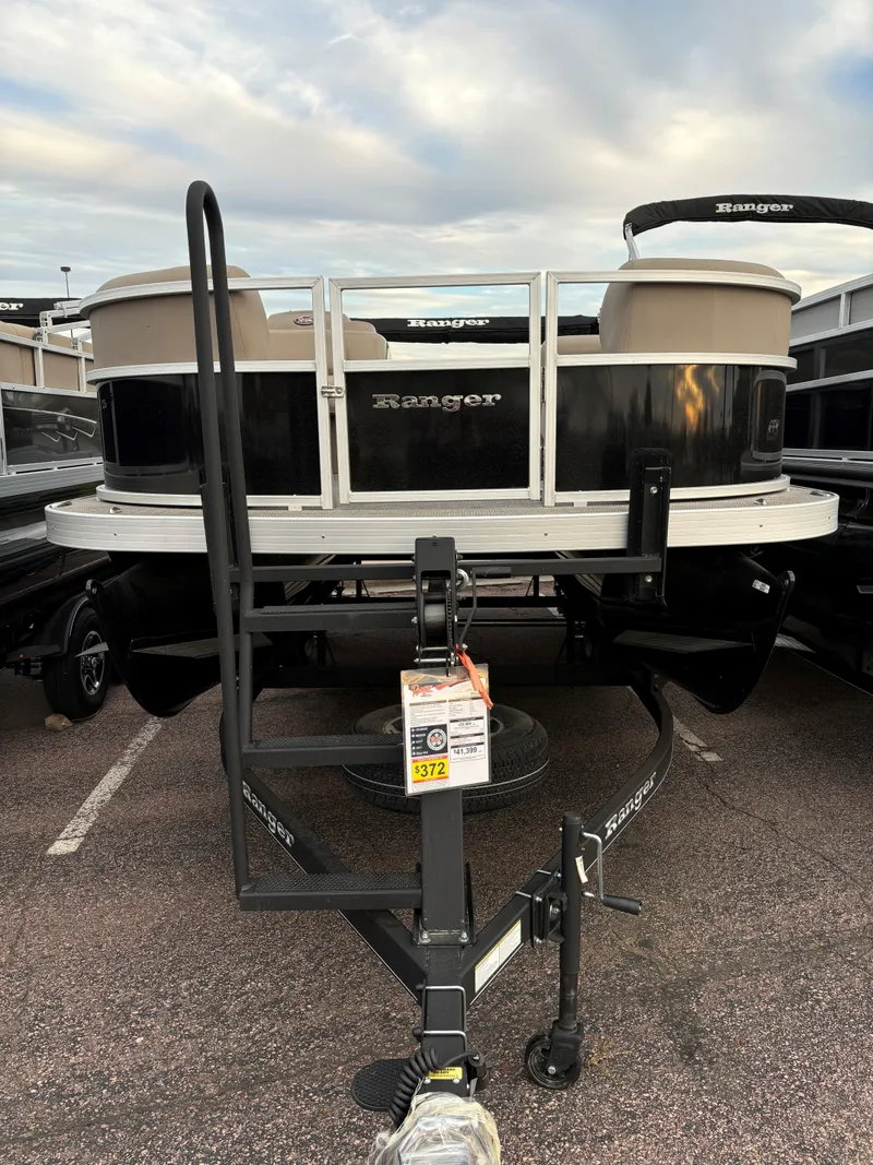 Slide: The Image of 2024 Ranger Reata 200C pontoon boat on trailer, front view. - 3
