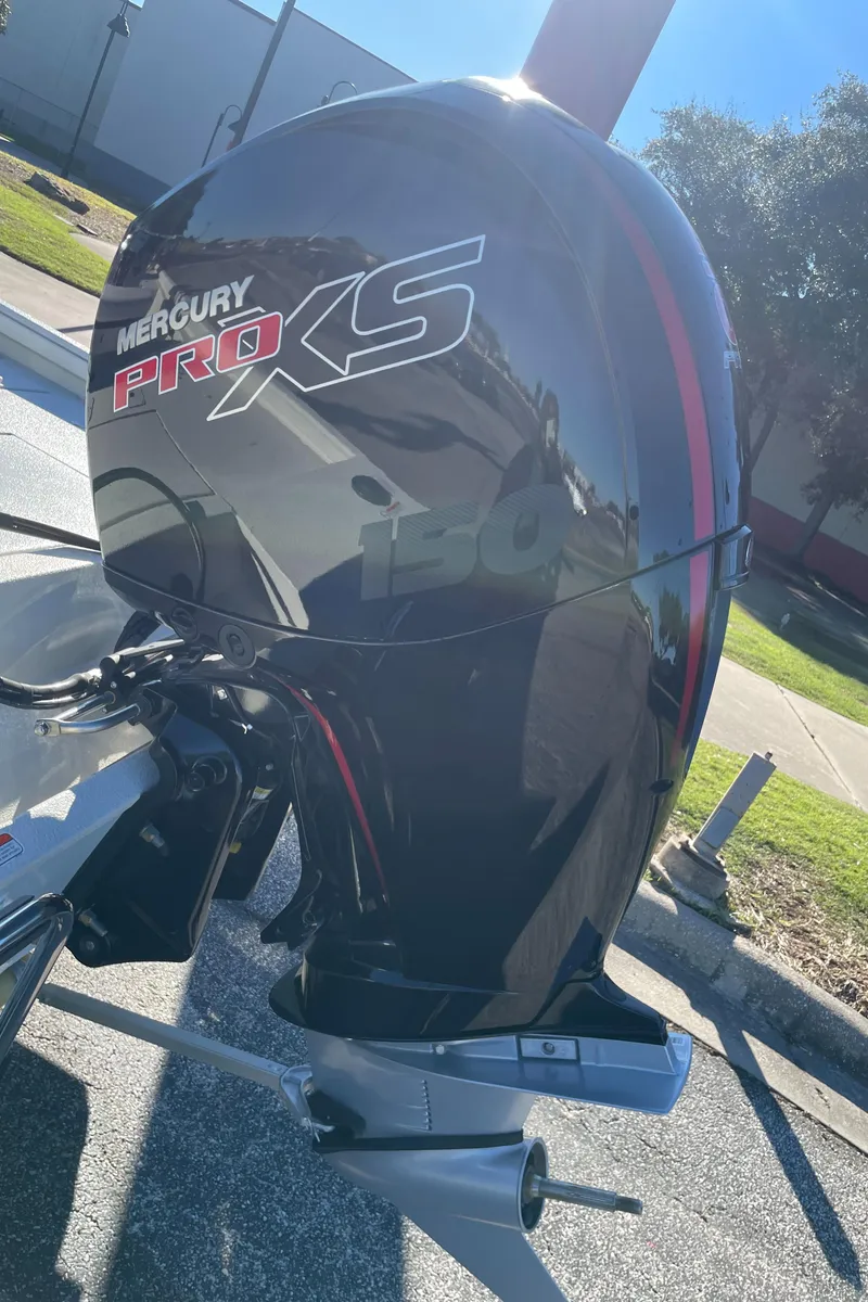 Slide: The Image of 2024 Ranger RB200 with Mercury Pro XS outboard motor in sunlight. - 3