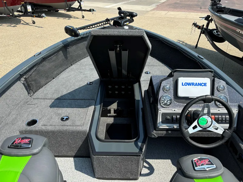 Slide: The Image of 2024 Ranger VS1882SC Angler boat interior with Lowrance electronics and storage compartment. - 6