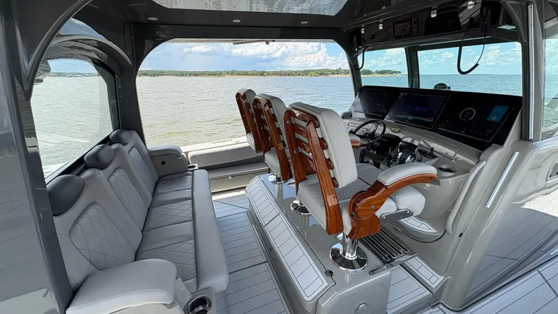 Slide: The Image of Interior of 2021 HCB 53 boat with luxurious seating and advanced navigation system. - 20