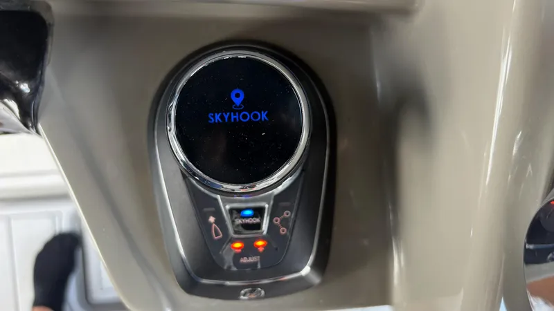 Slide: The Image of Skyhook control panel on 2021 HCB 53 boat dashboard. - 31