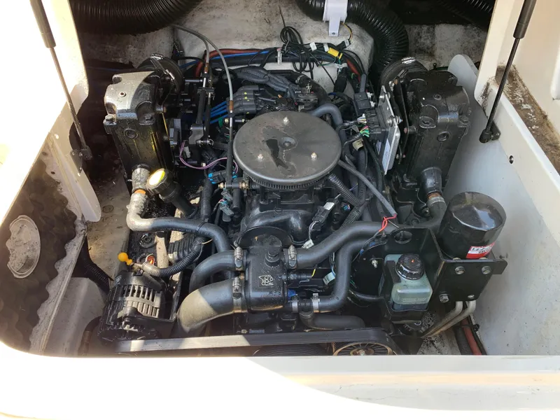 Slide: The Image of Engine compartment of a 2005 Sea Ray 220 Sundeck boat. - 10