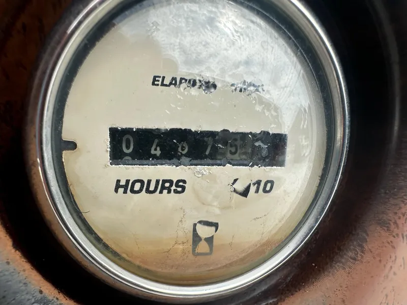 Slide: The Image of Close-up of 2003 Godfrey Hurricane FD211 hour meter showing 497.5 hours elapsed. - 8