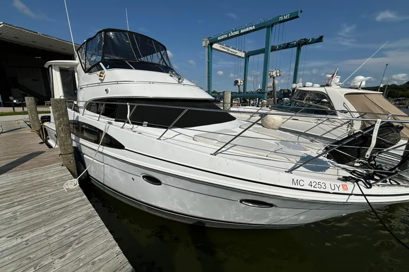 Slide: The Image of 2002 Carver 444 Cockpit Motor Yacht docked at North Shore Marina. - 4