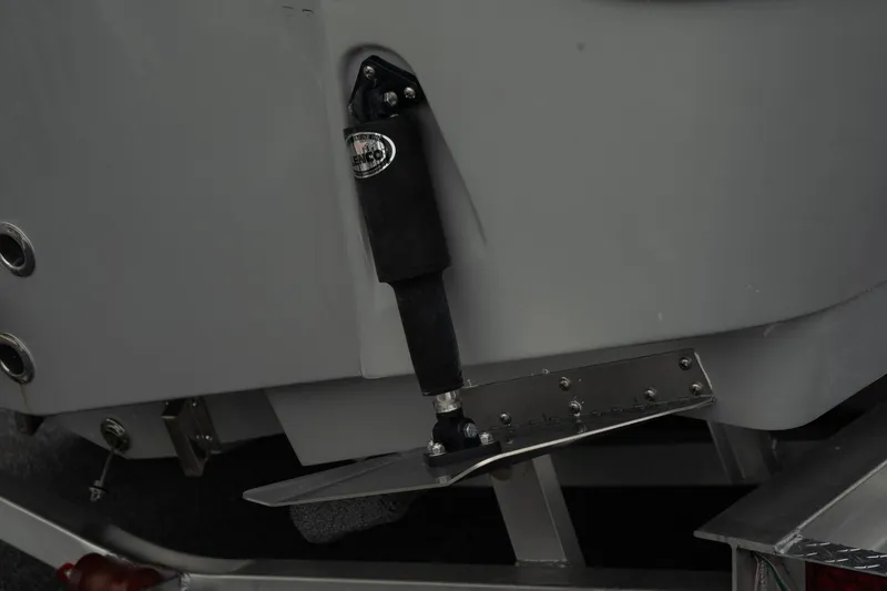 Slide: The Image of 2023 Blue Wave 2600 Makaira boat trim tab detail. - 11