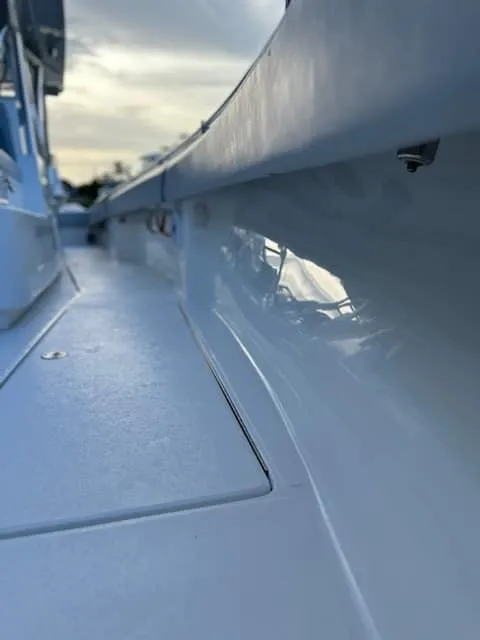 Slide: The Image of Close-up of 2021 SeaHunter 41 CTS boat deck with sleek design. - 4