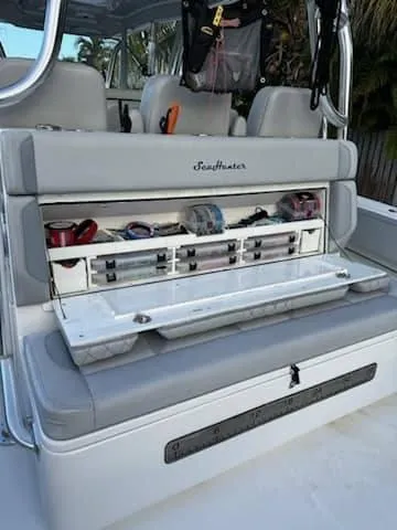 Slide: The Image of 2021 SeaHunter 41 CTS boat with open tackle storage and seating. - 5