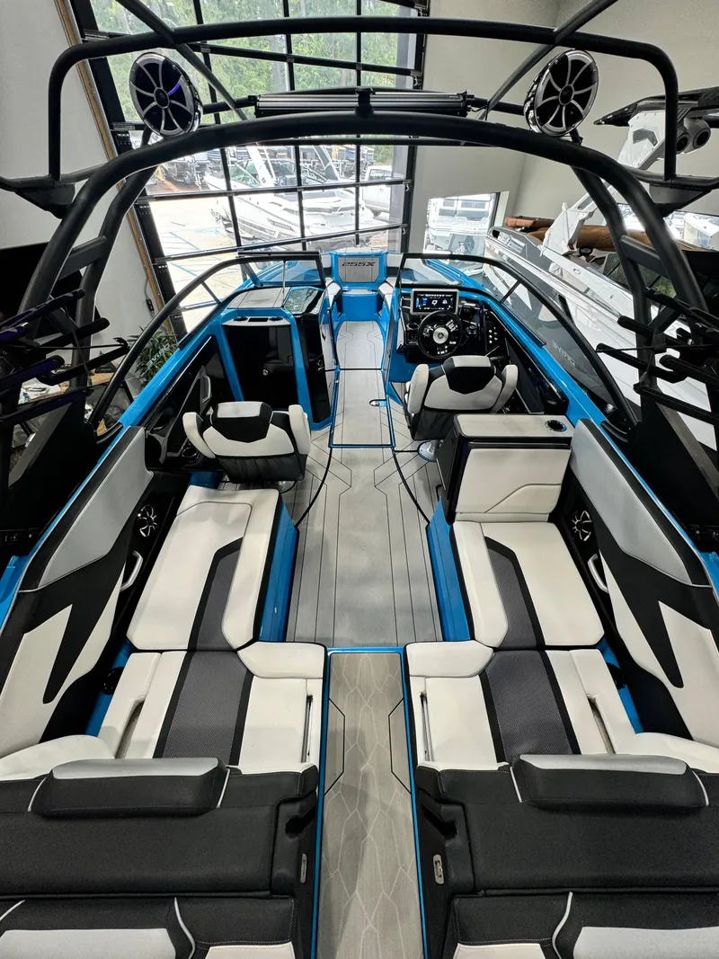 Slide: The Image of 2022 Yamaha Boats 255XD interior, featuring sleek seating and modern design. - 7