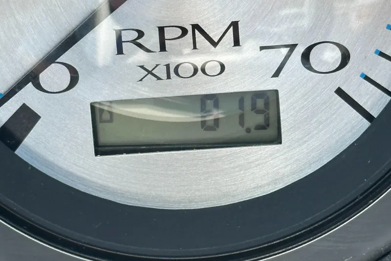 Slide: The Image of Close-up of 2022 Bennington 23LSB RPM gauge displaying 19 RPM. - 25