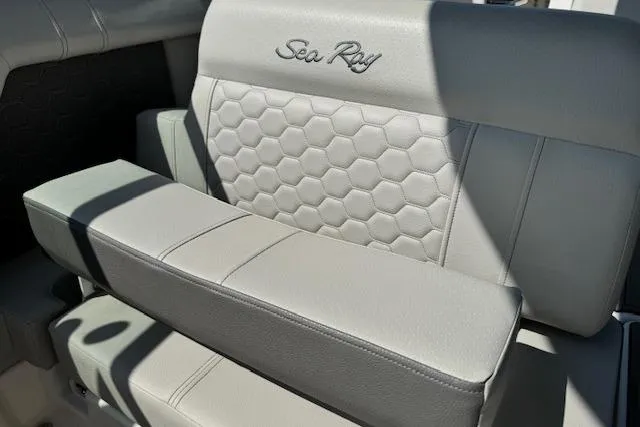 Slide: The Image of 2023 Sea Ray SDX 290 Outboard boat seat with hexagonal pattern and embroidered logo. - 16