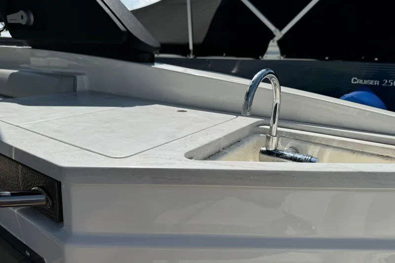 Slide: The Image of 2023 Sea Ray SDX 290 Outboard boat sink and countertop detail. - 19