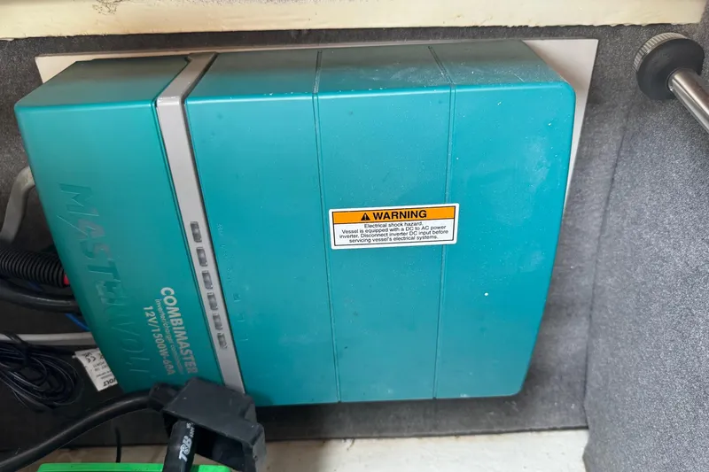 Slide: The Image of Electrical system in 2023 Sea Ray SDX 290 Outboard boat, featuring a Mastervolt CombiMaster inverter. - 25